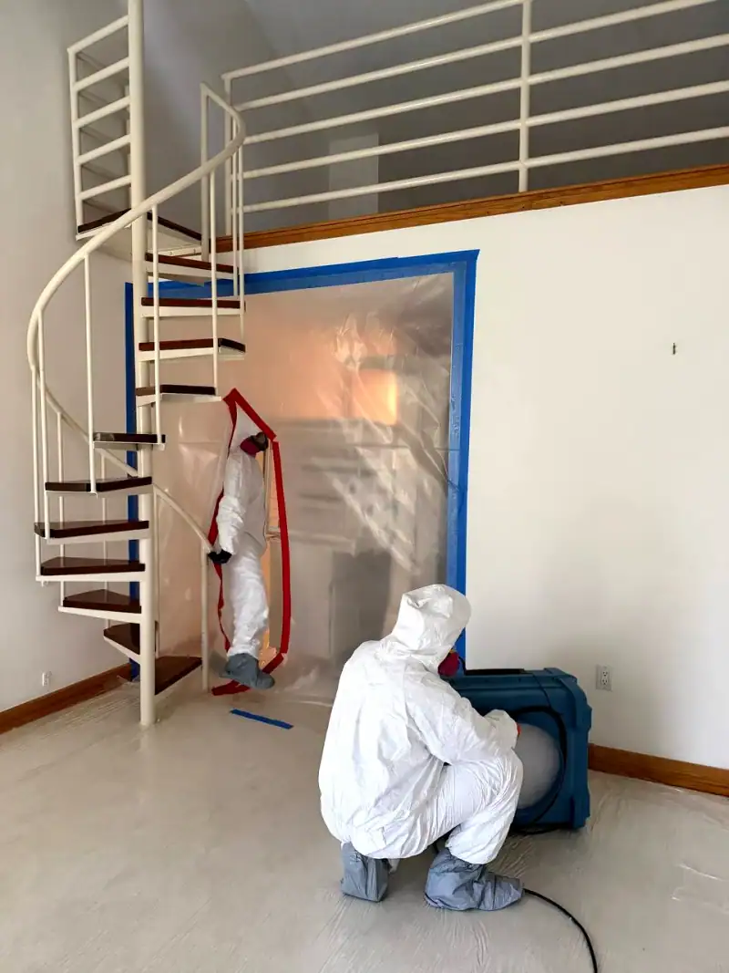 24/7 Service Pros technicians working on a water damage restoration job