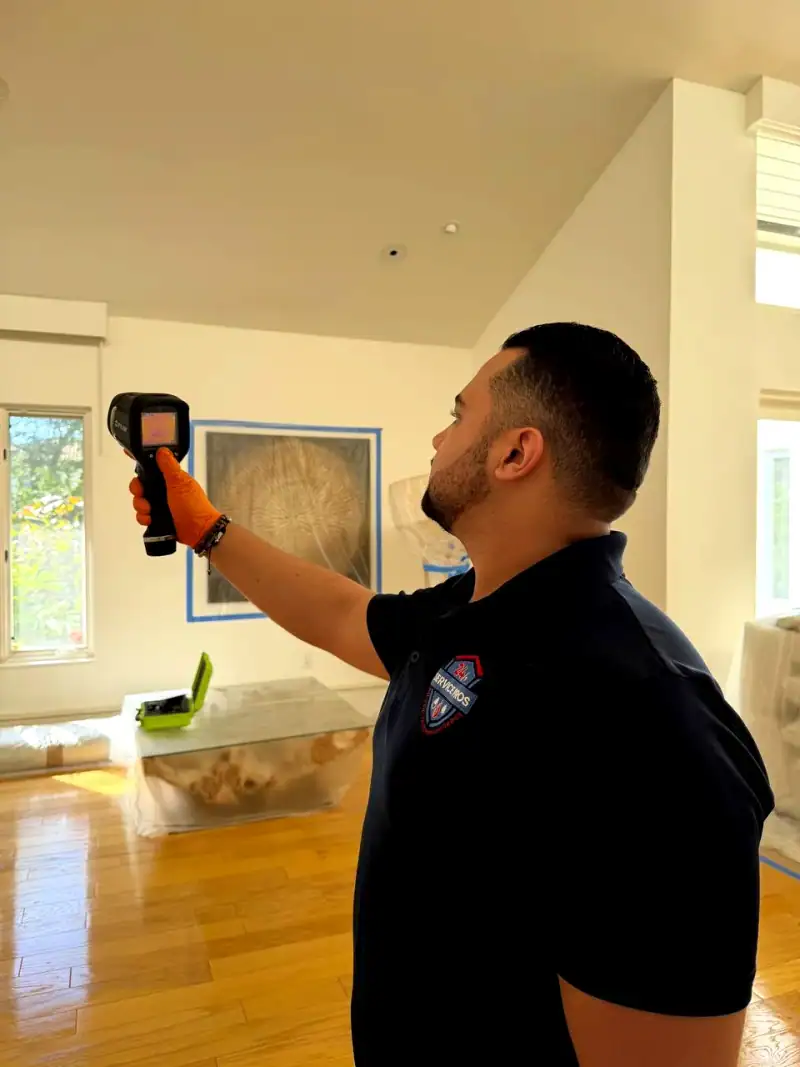 24/7 Service Pros technicians working on a water damage restoration job