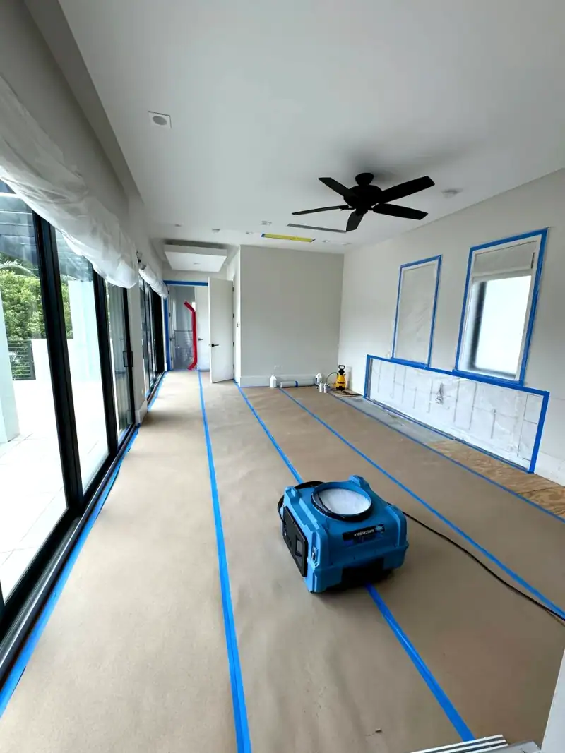 24/7 Service Pros technicians working on water damage restoration in Miami Beach, FL