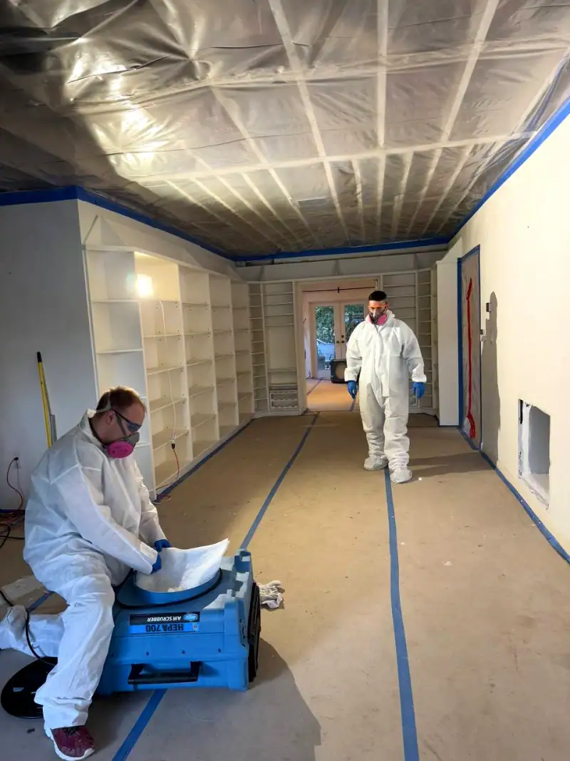 24/7 Service Pros technicians working on a water damage restoration job